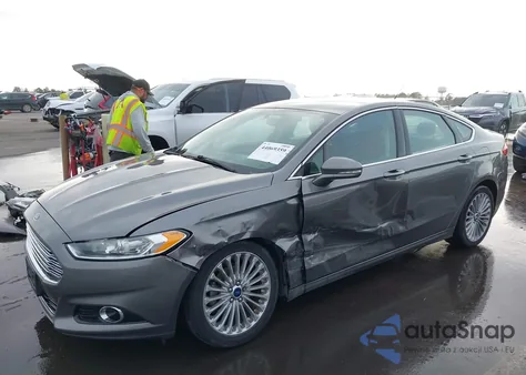 2014 Ford Fusion Titanium z USA, uszkodzony, nr VIN 3FA6P0D96ER281443